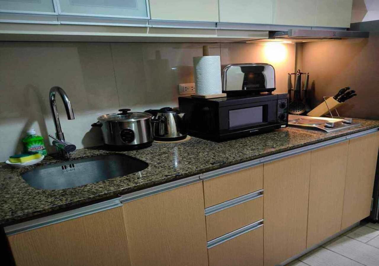 Avery's Place @ One Eastwood Avenue Apartment *