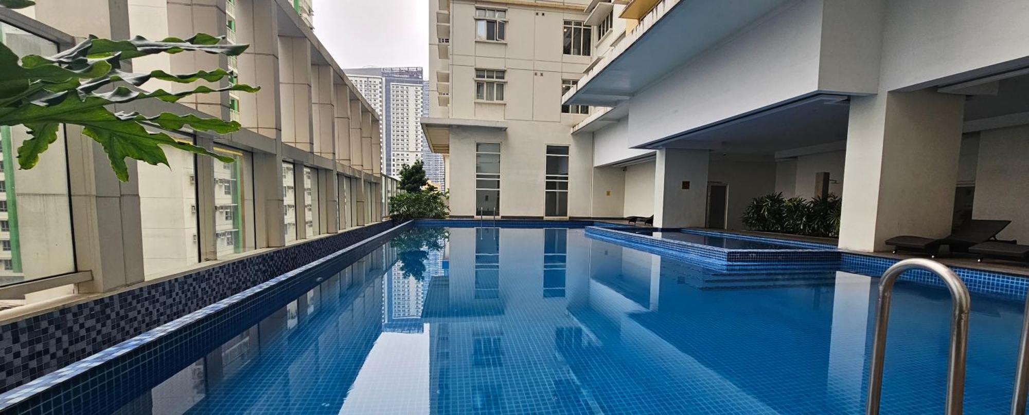Makati Bliss - Cozy Urban Retreat Apartment