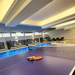 Burgundy Mckinley Place Service Apartment