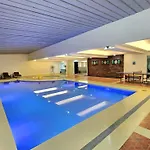 Burgundy Mckinley Place Service Apartment