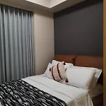Savvy Suites Combined 6Br Near Okada