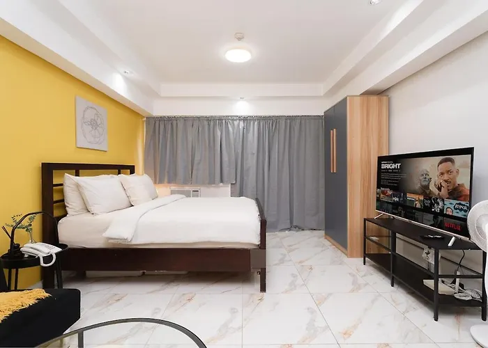 Greenbelt Makati Condo With Balcony & Park Views