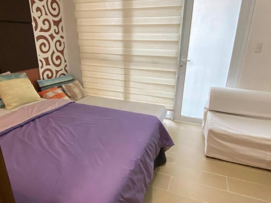 Apartment Venice Group Staycation & B1 Pay Parking Manila