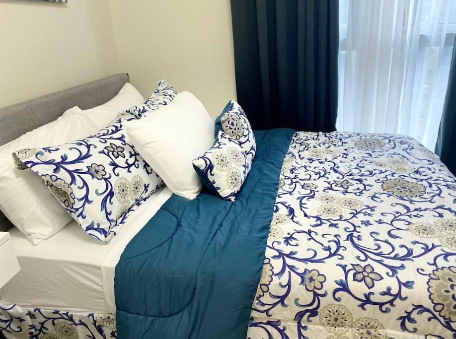 Faye's Cozy & Modern 1br At Uptown Bgc Apartment *