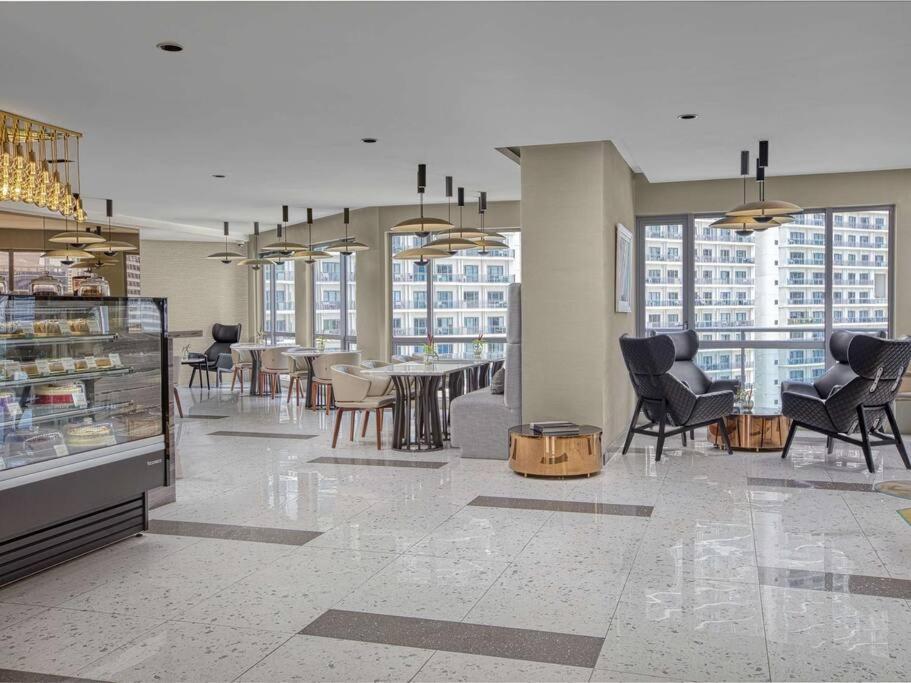 Novotel Manila Aqua Residences Near Makati By Hamodi'Scrib Manila