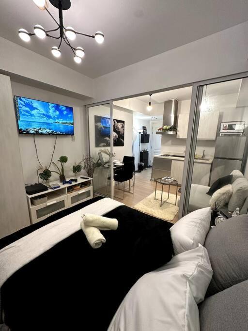 El Spacio Azure 1br With Ps4 & Netflix Apartment Manila