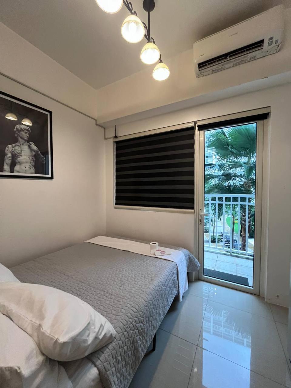 Aparthotel Biglaang Lakad By Metro Staycation *