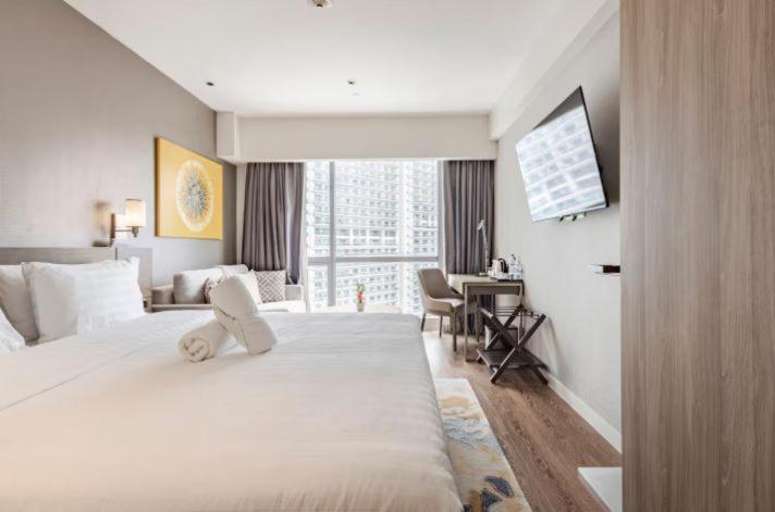 Novotel Manila Aqua Residences Near Makati By Hamodi'Scrib Apartment *
