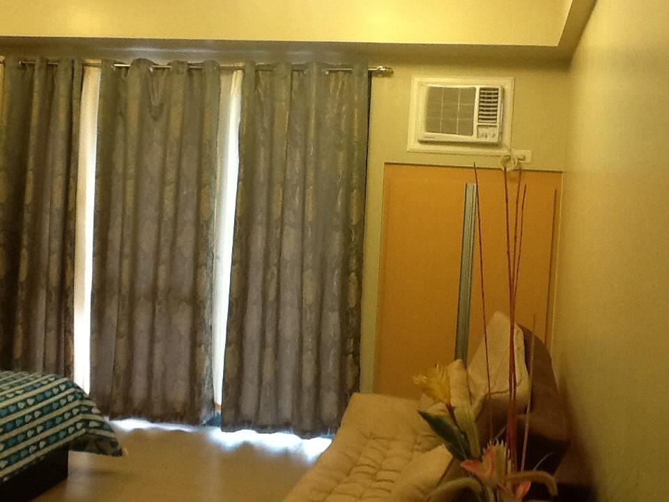 Palm Tree Genlex Apartment Manila