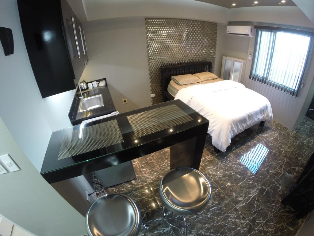 Burgundy Mckinley Place Service Apartment