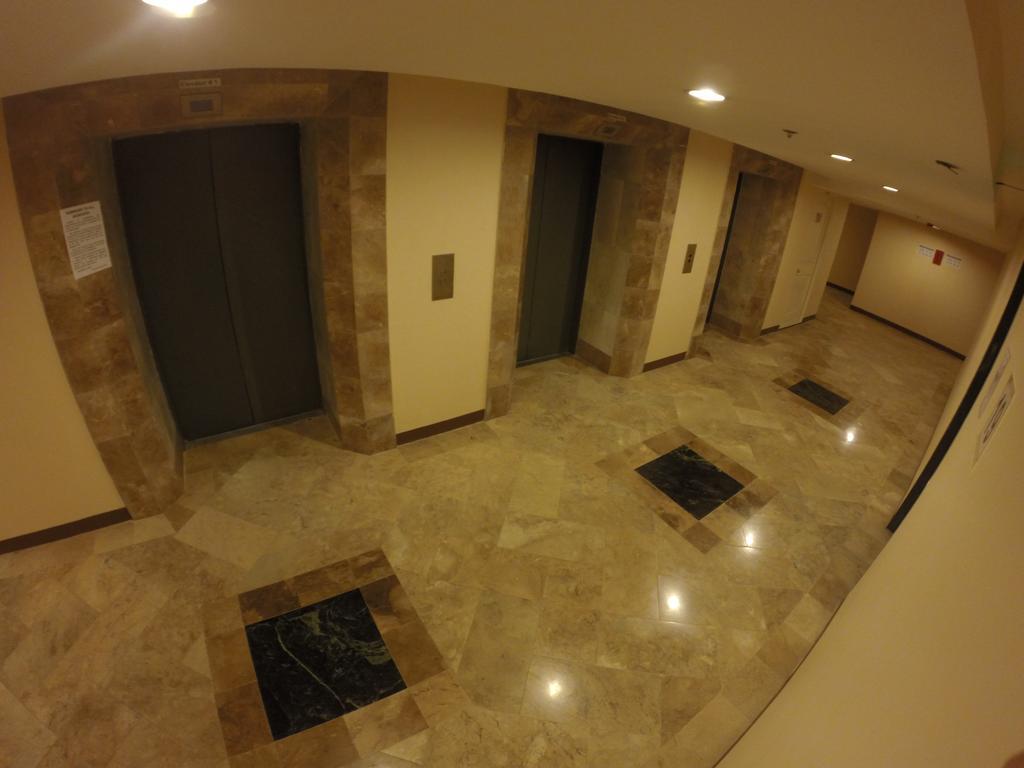 Burgundy Mckinley Place Service Apartment