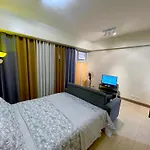 Econo Rooms Two Palm Tree Villa