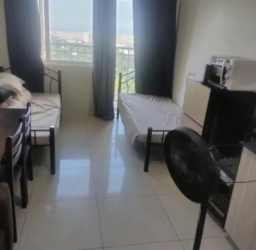 Condo With Two Single Beds And Balcony Facing Manila View