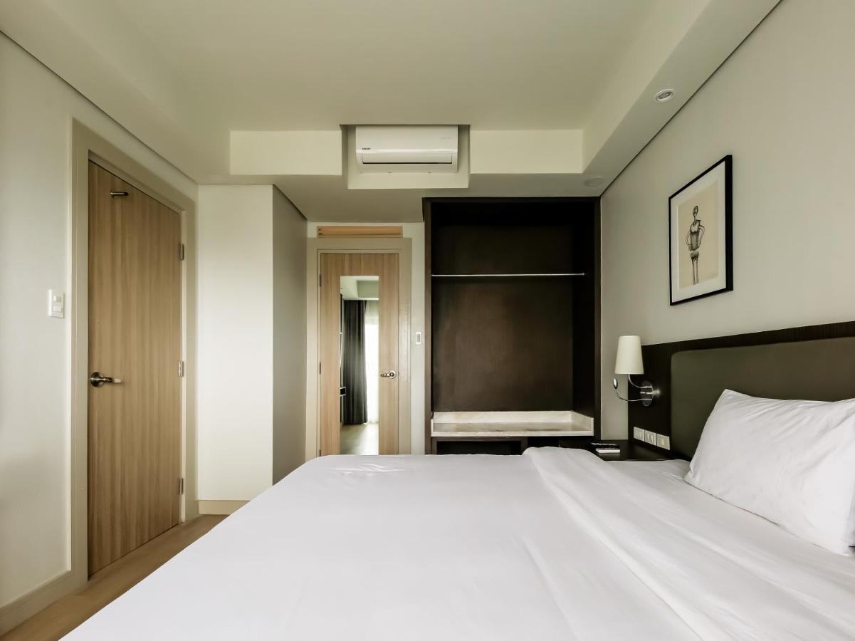 Capital O 804 The Residences At Bonifacio Civic Center Hotel