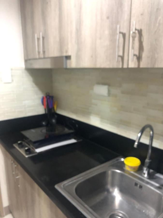 S Residences Moa - Alano's Place Apartamento