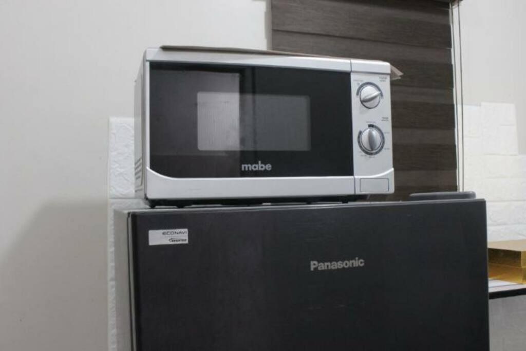 A2j Comfy W/ 120in Cinema + Jacuzzi Near Naia Holiday home