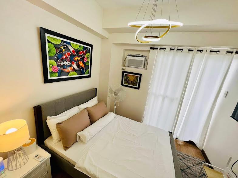 Infina Towers Affordable Staycation Guest house *