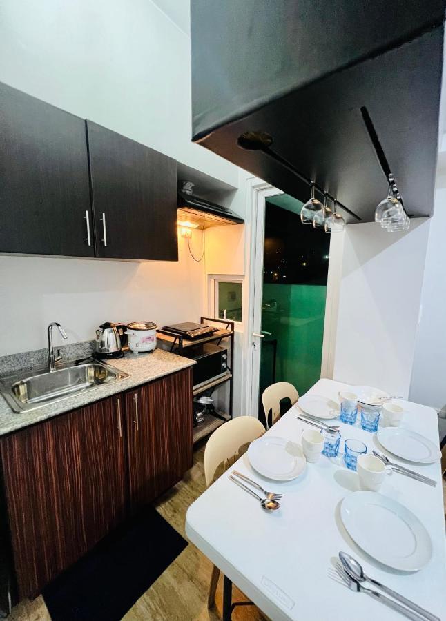 At With Free Pool Access Apartment Manila