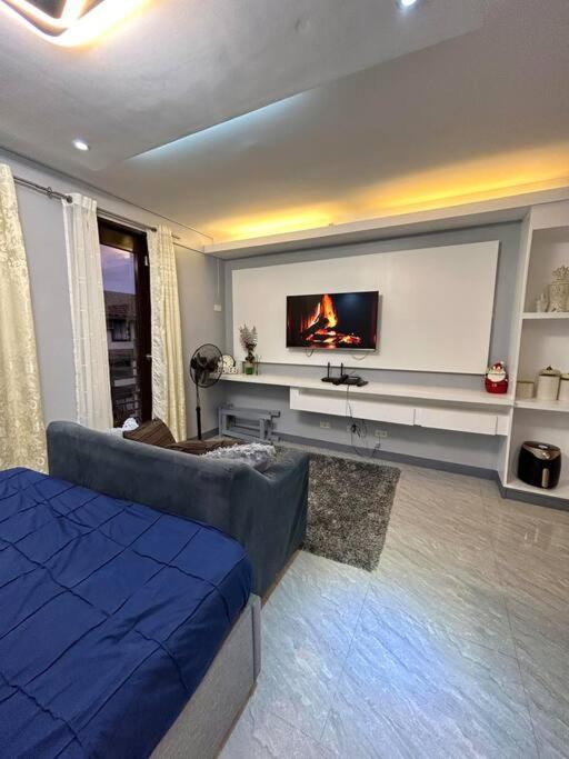 Racky's Condotel - Type With Vibe Manila