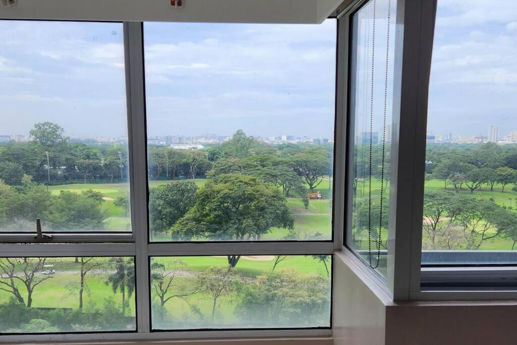 Apartment Enjoy Bgc Sunset And Golf Course View 2 Bedroom Loft With 100mbps Internet Connection