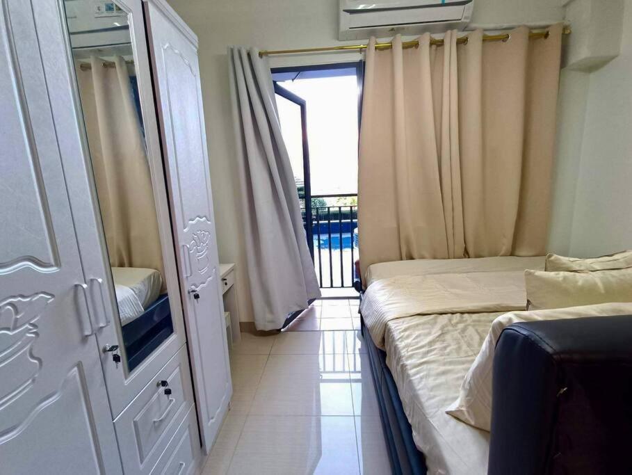 P00l Fr0nt With Balc0ny - New C0nd0 At Shore 2 Mall Of Apartment