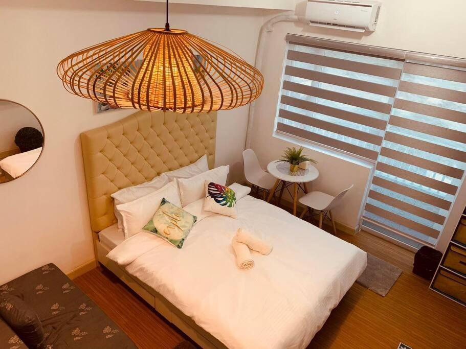 Apartment Retreat: Wi-fi, Netflix & Pool Access Near Bgc *
