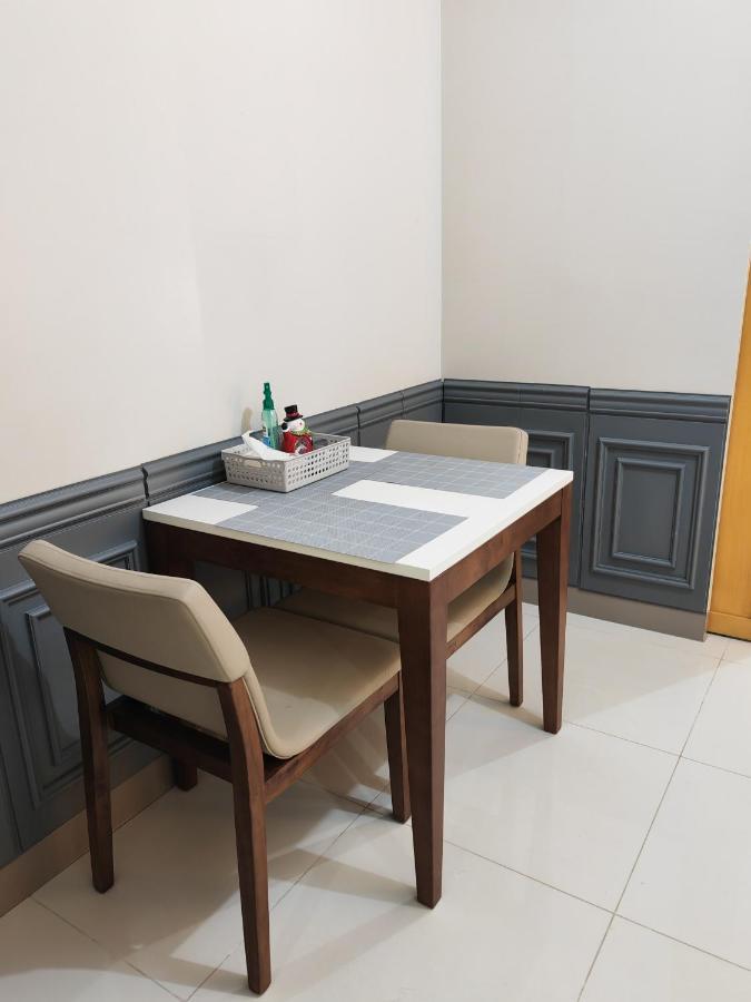 One Uptown - Thompson Suites Manila