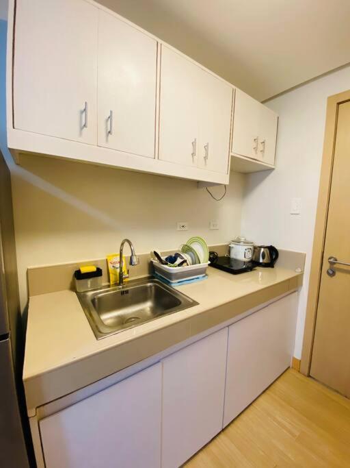 Trees Residences Staycation Evol's Place