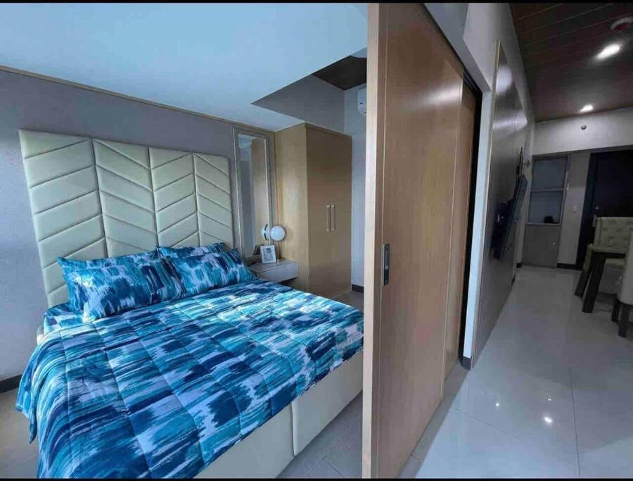 Stylish 1br Uptown Parksuites Bgc, 200mbps/smarttv Apartment
