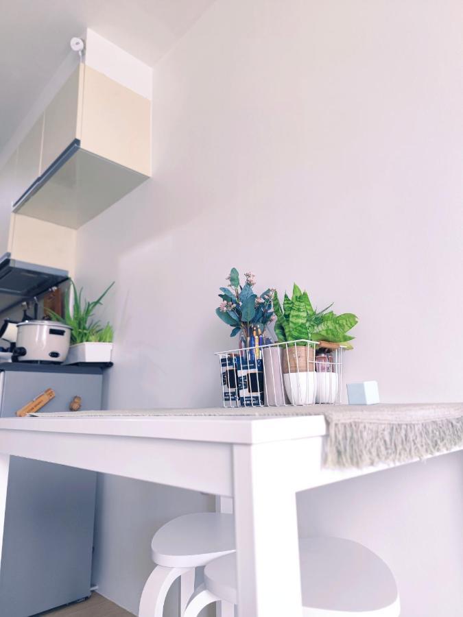 -condo- Petite Residential Manila