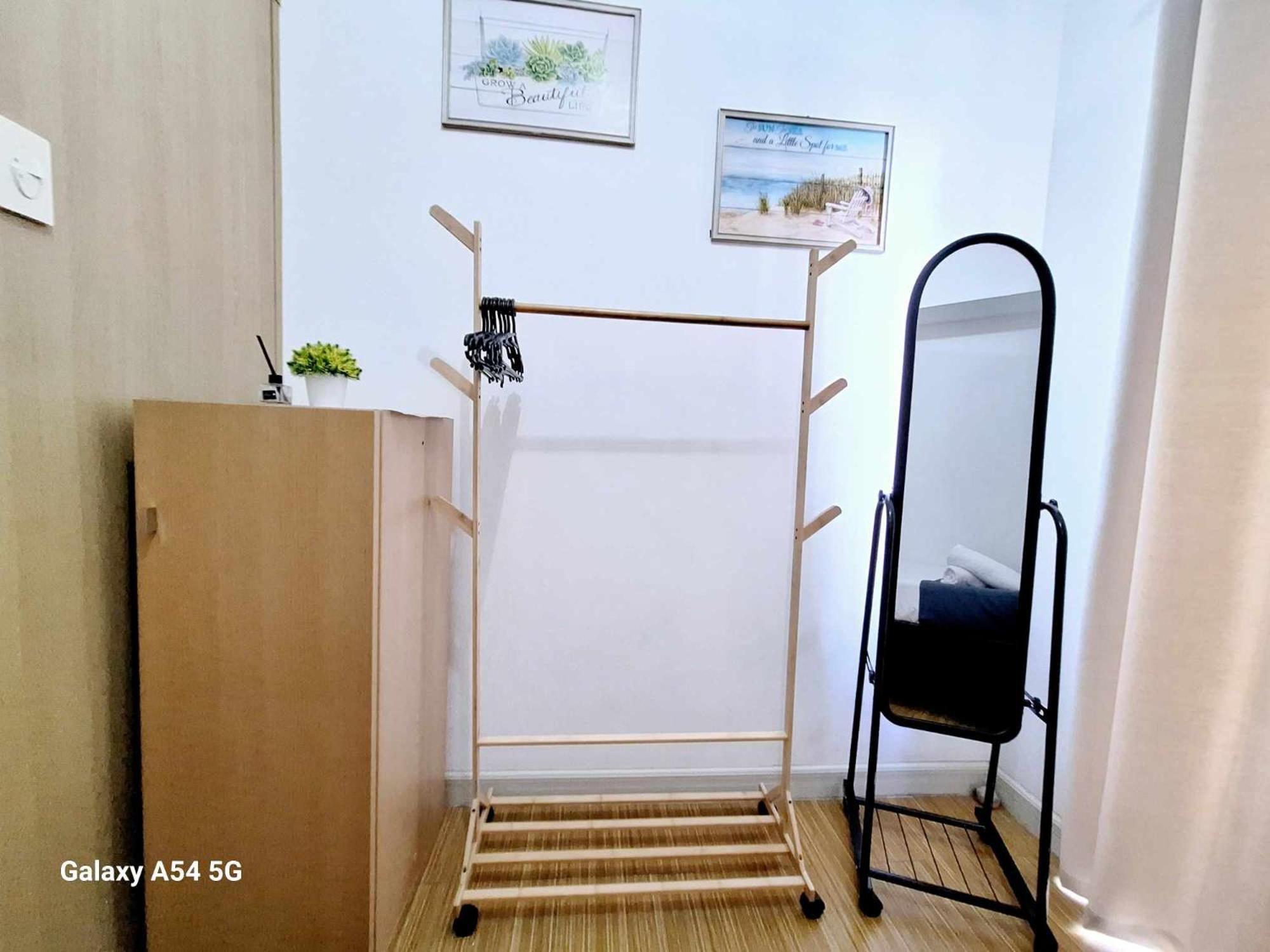 Bright And Cozy 1 Bedroom With Balcony Pool View And Wifi In Grace Residences Apartment Manila