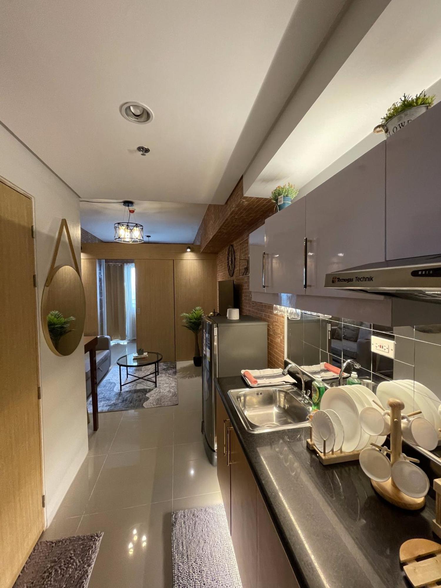 Grass Residences Industrial-themed Staycation Apartment