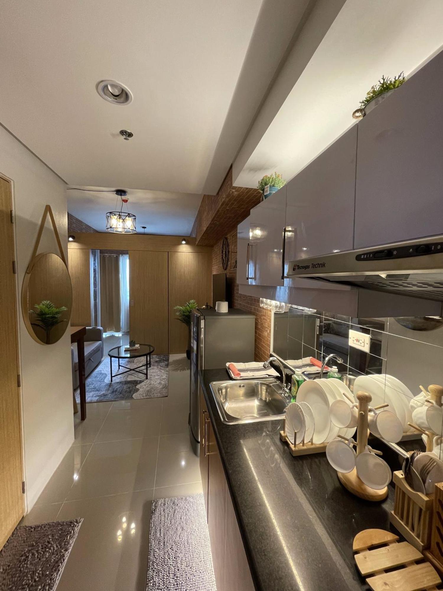 Grass Residences Industrial-themed Staycation Apartment *