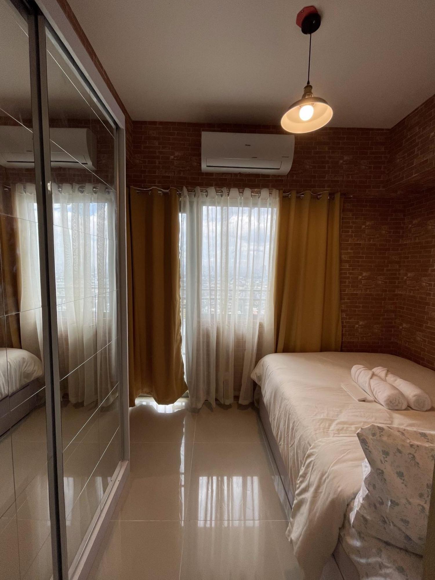 Grass Residences Industrial-themed Staycation Apartment Manila