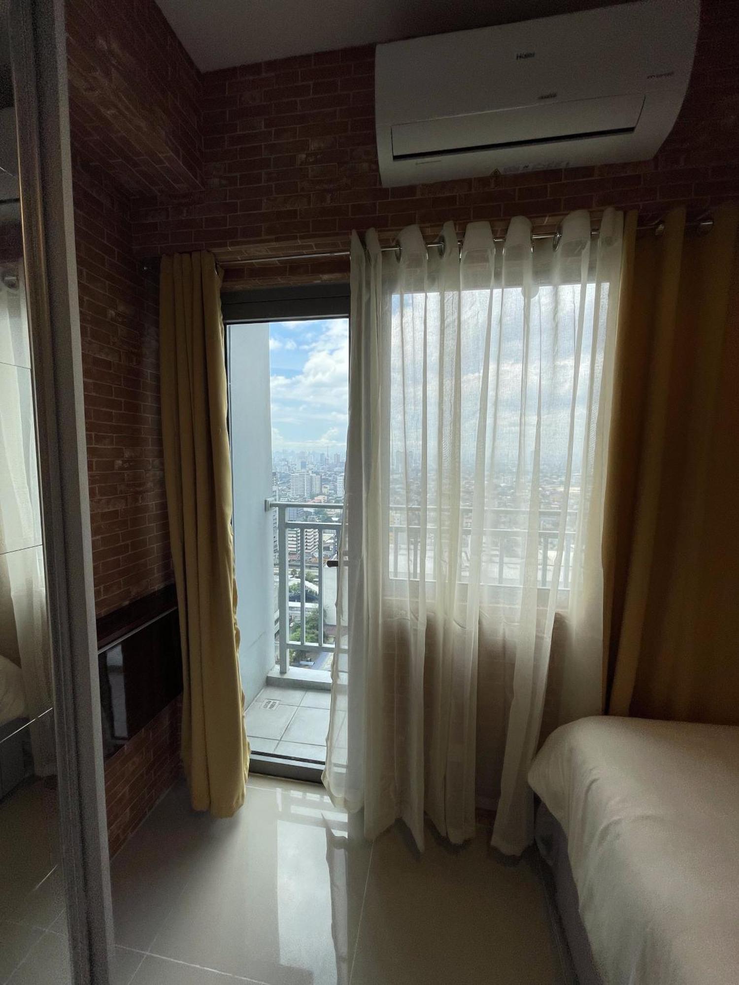 Apartment Grass Residences Industrial-themed Staycation *