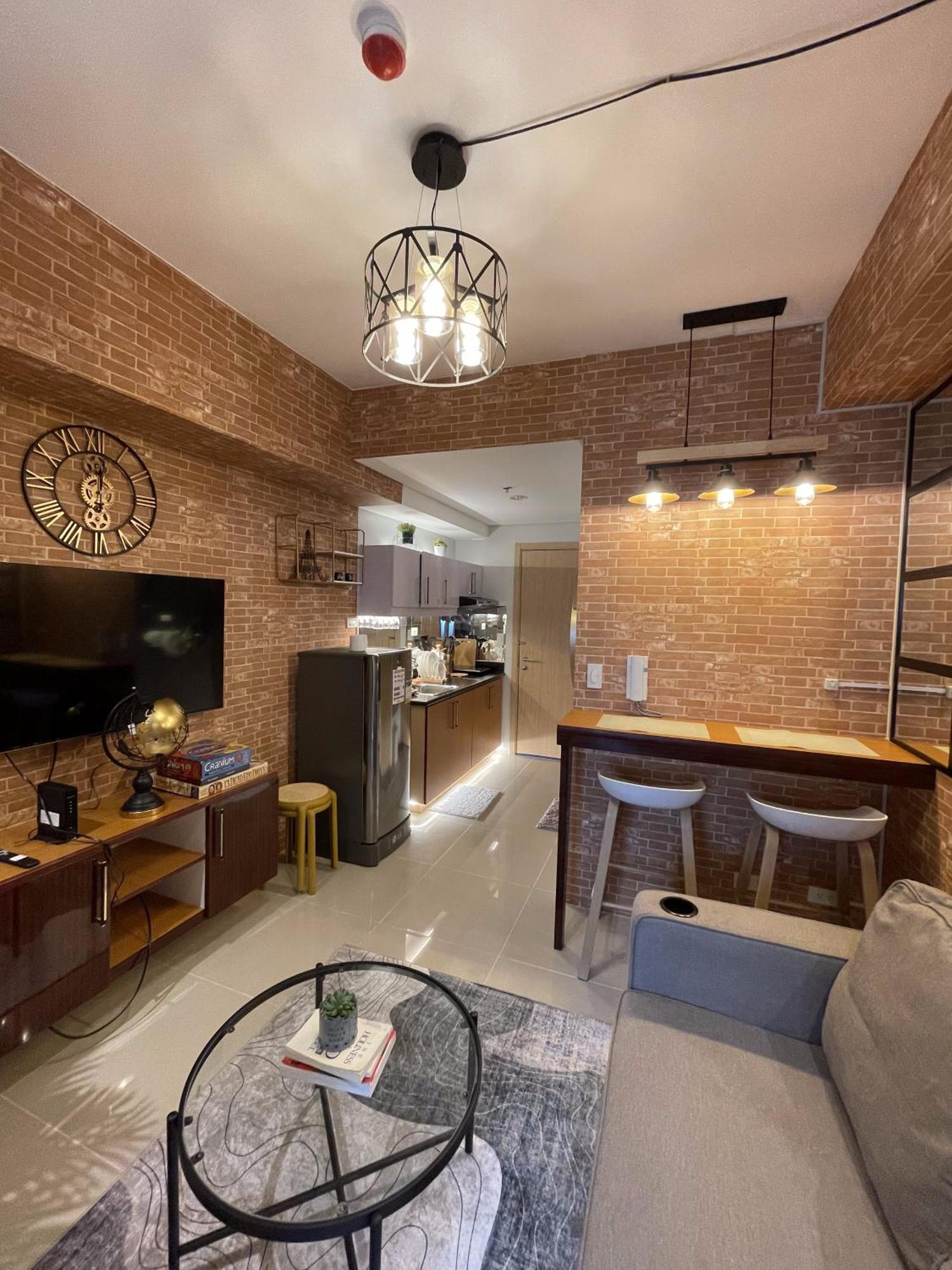 Apartment Grass Residences Industrial-themed Staycation *