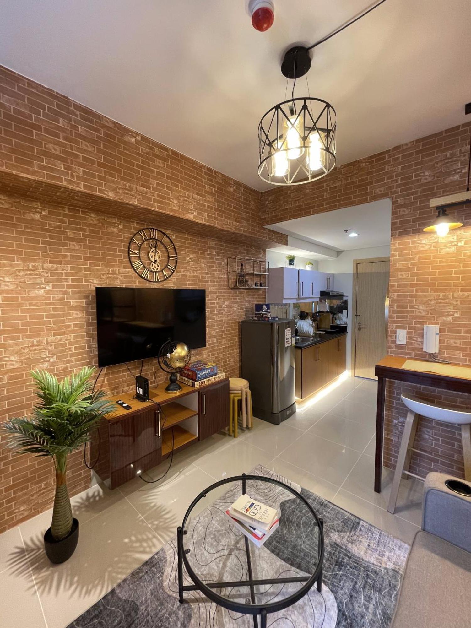 Grass Residences Industrial-themed Staycation Apartment