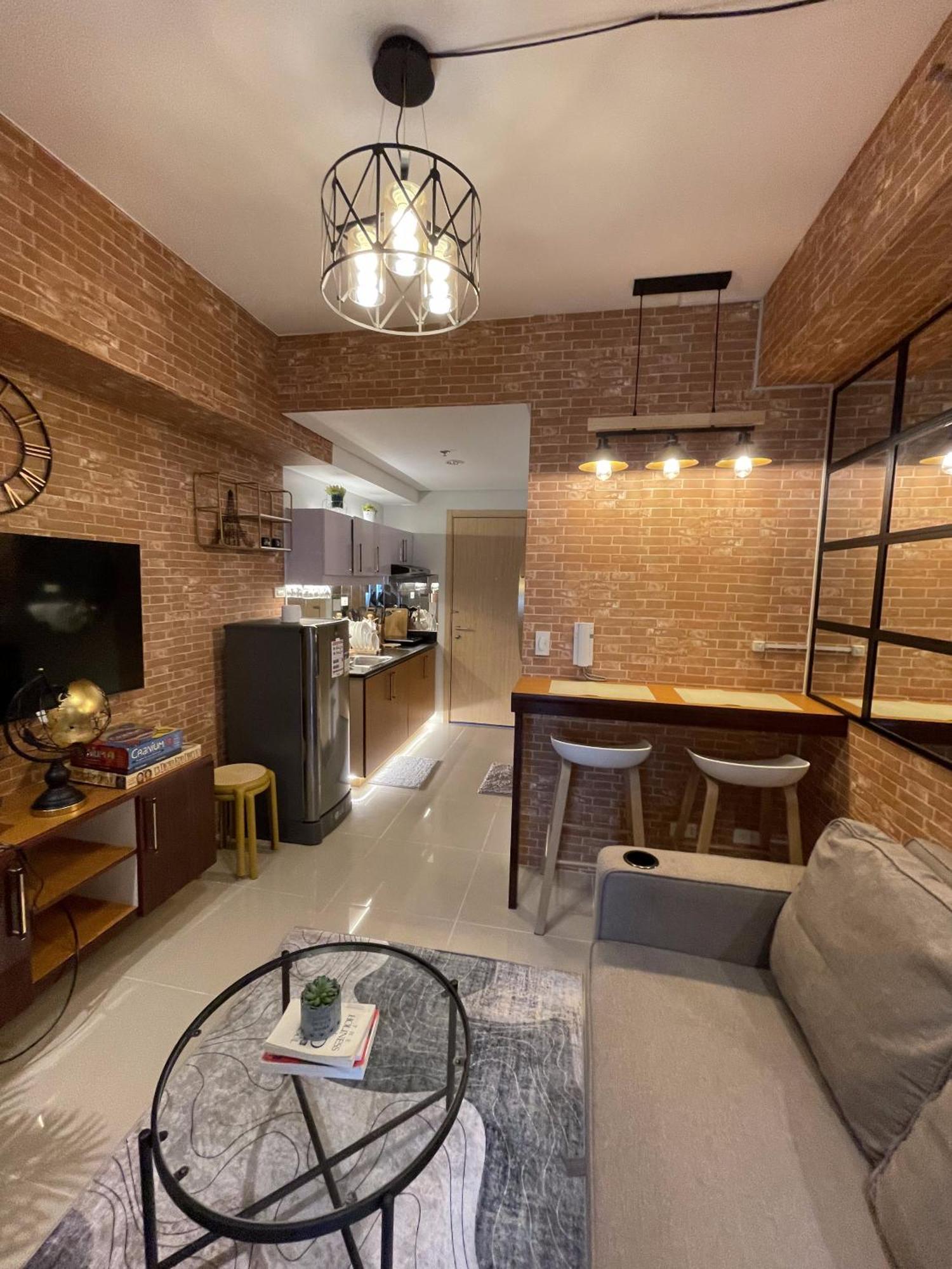 Apartment Grass Residences Industrial-themed Staycation *