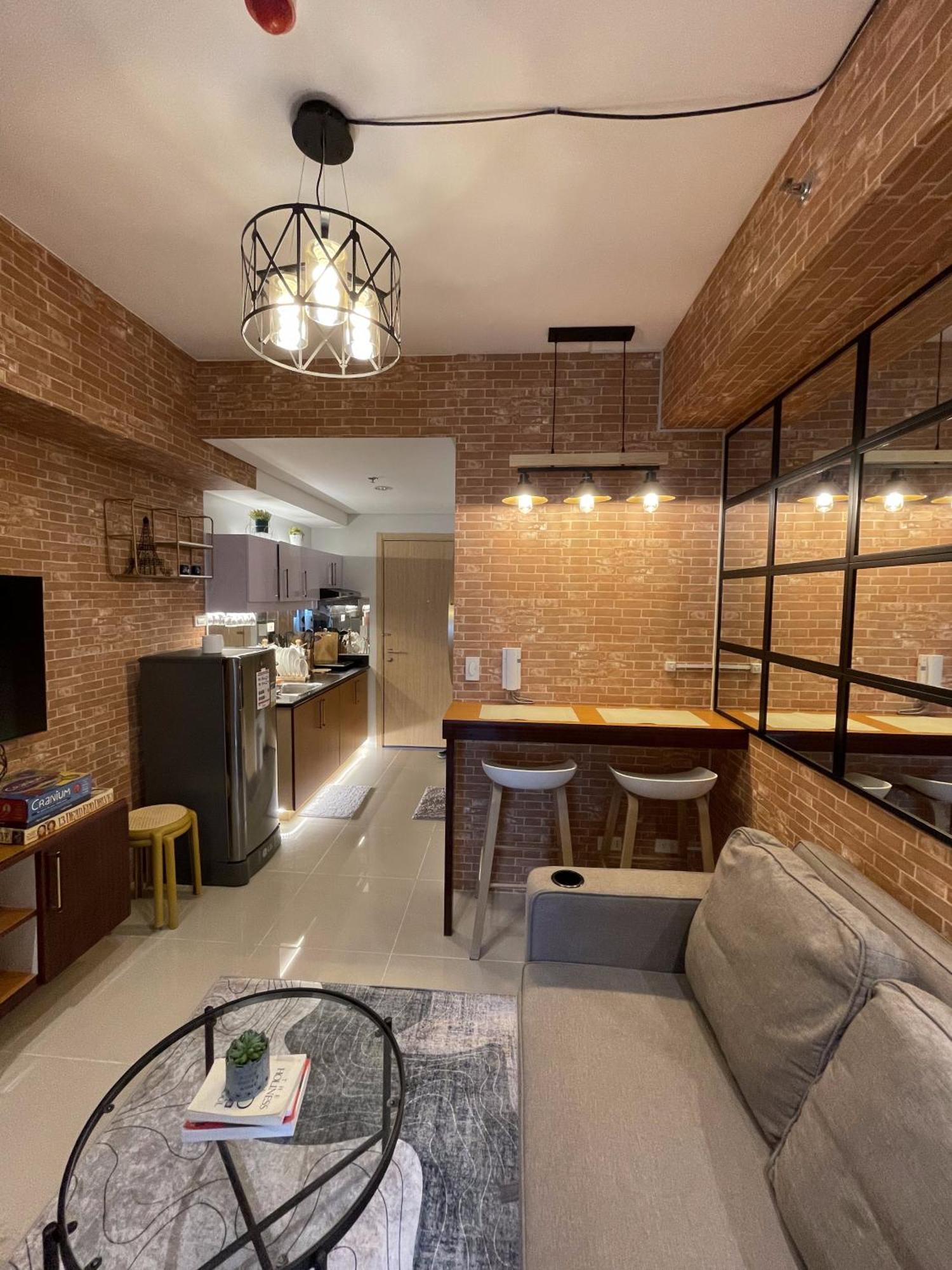 Apartment Grass Residences Industrial-themed Staycation *