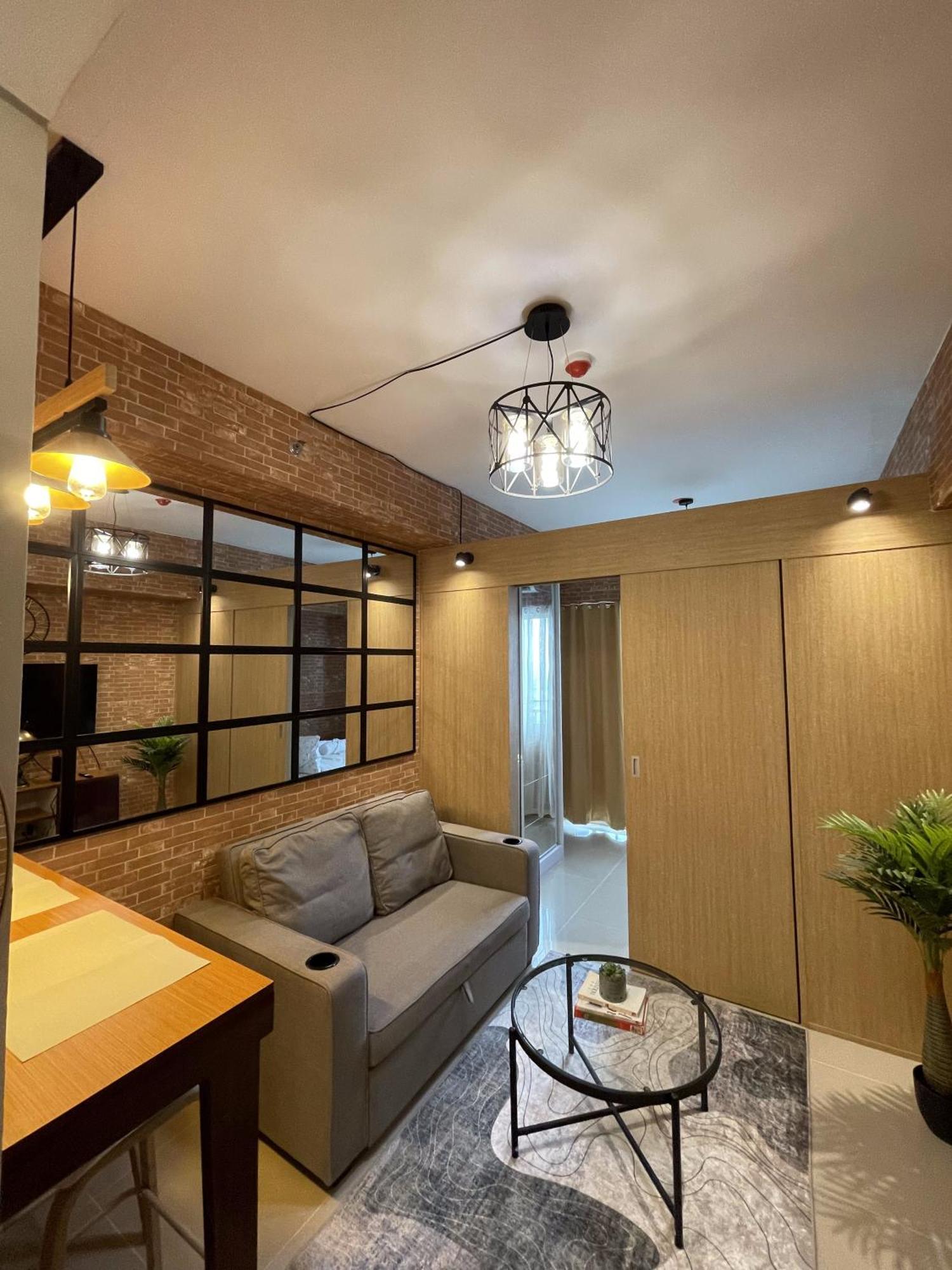 Apartment Grass Residences Industrial-themed Staycation *