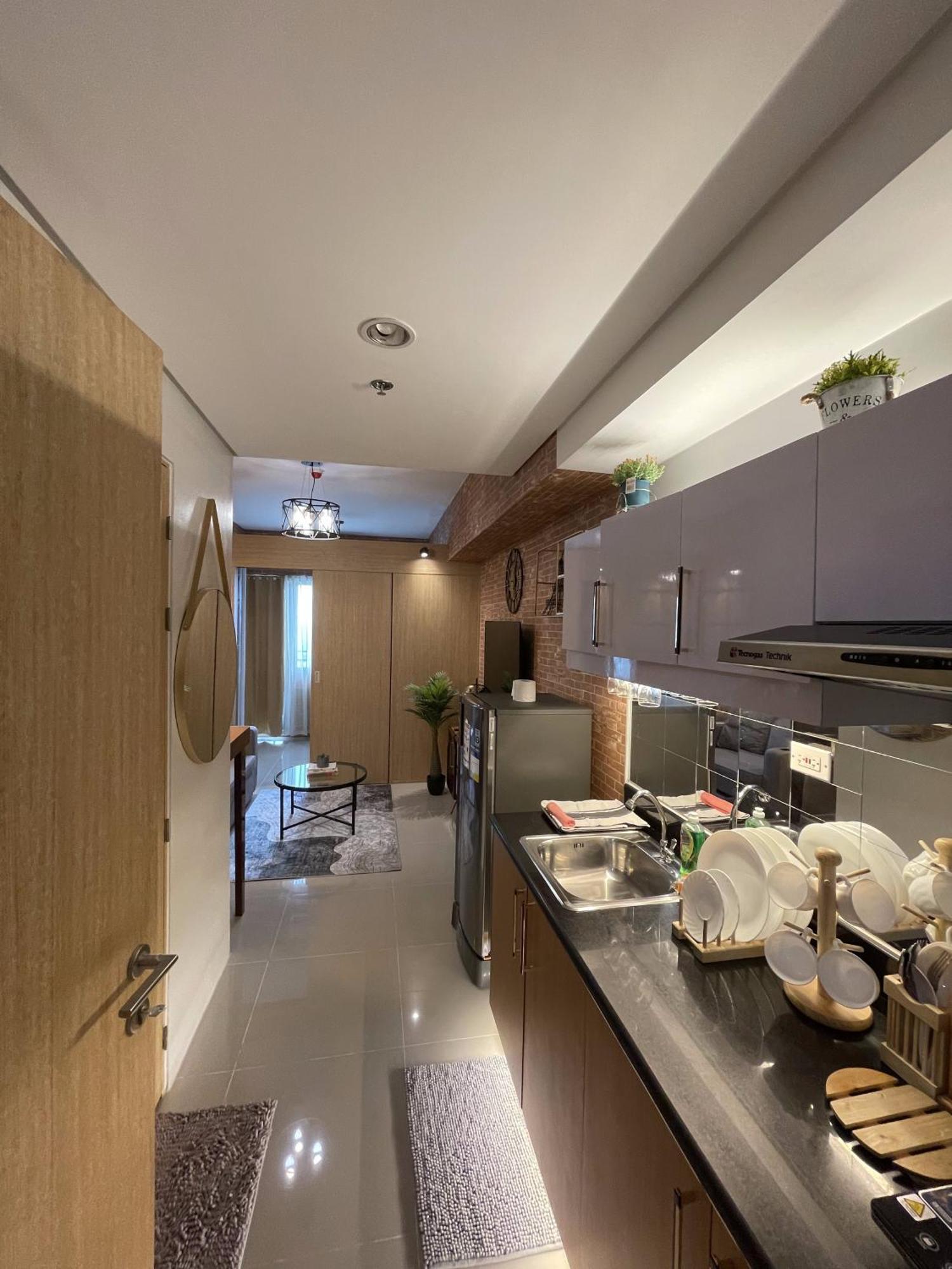Apartment Grass Residences Industrial-themed Staycation *