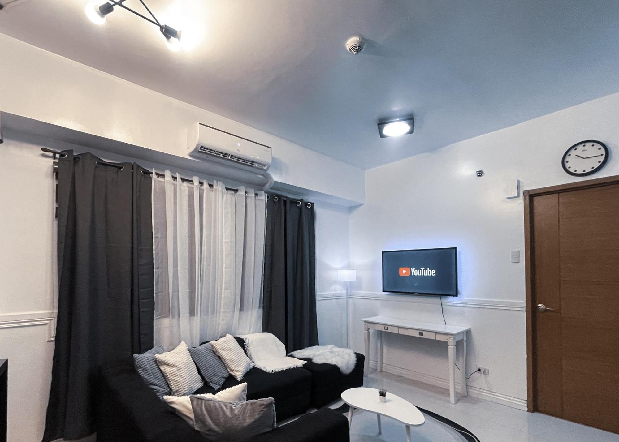 Apartment Cozy & Airy Near Venice Mall Free Pool & Gym Manila