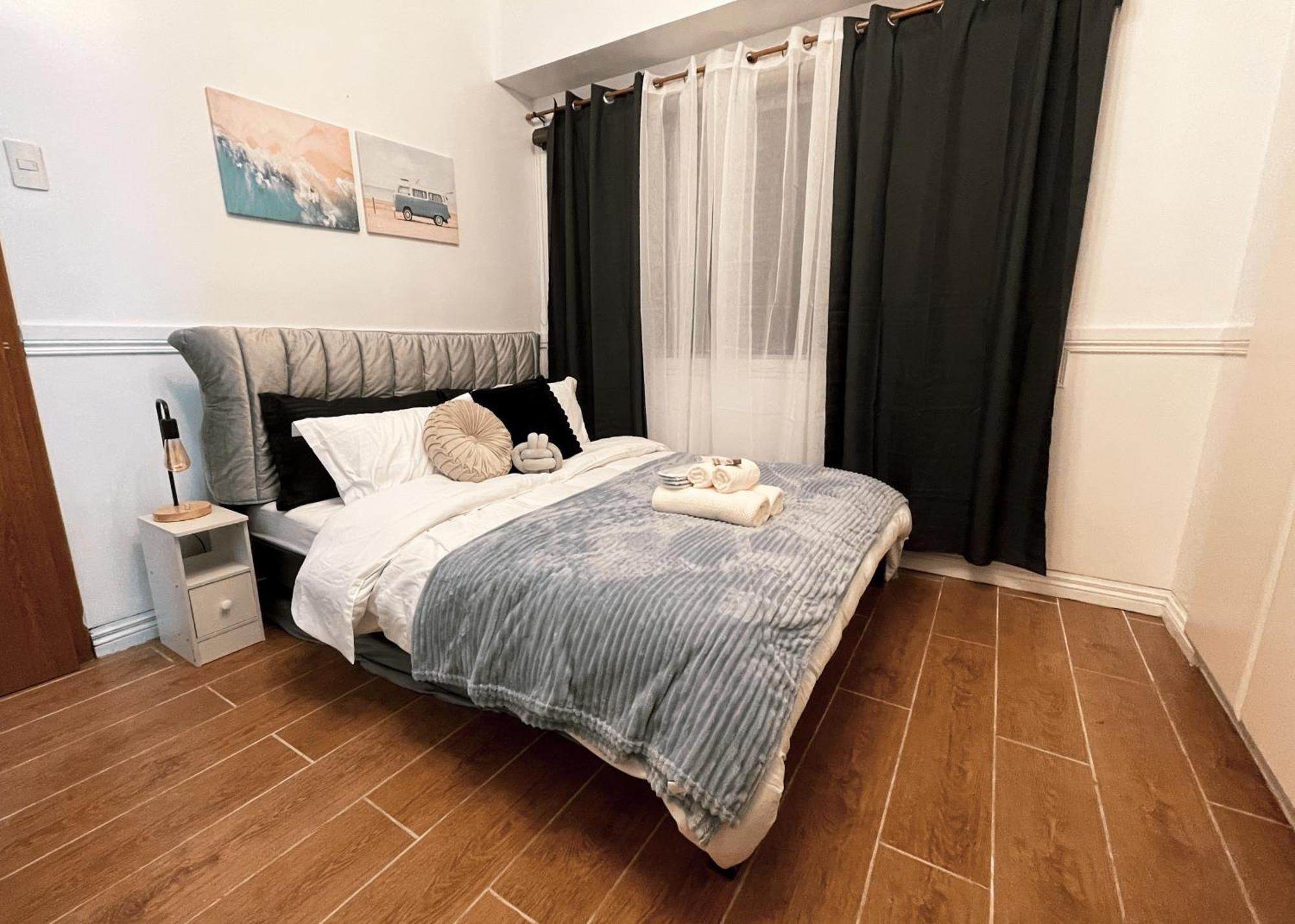 Cozy & Airy Near Venice Mall Free Pool & Gym * Manila