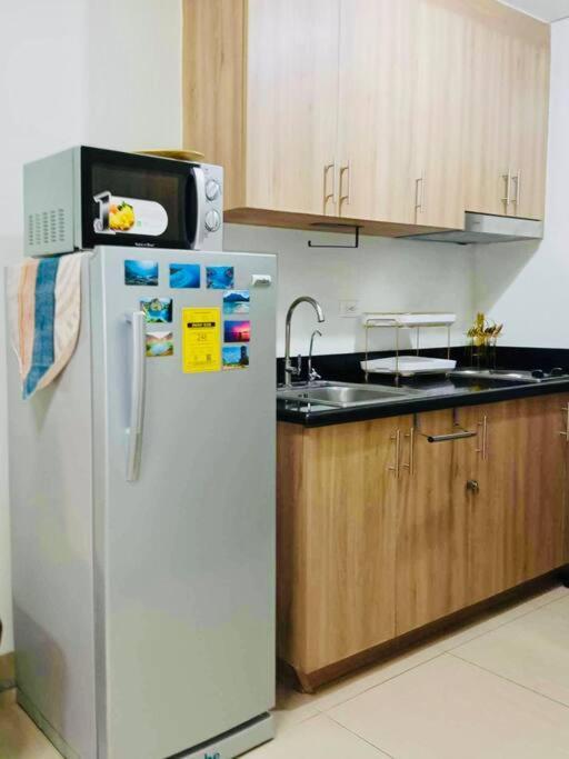 2 Condos, 5 Beds, 2 Cr @ Shore2 Moa Apartment *