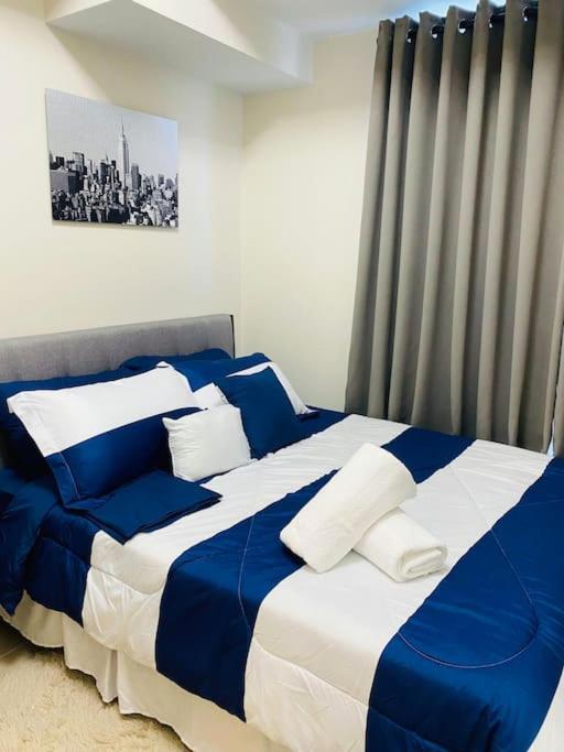Faye's Cozy & Modern 1br At Uptown Bgc Apartment Manila