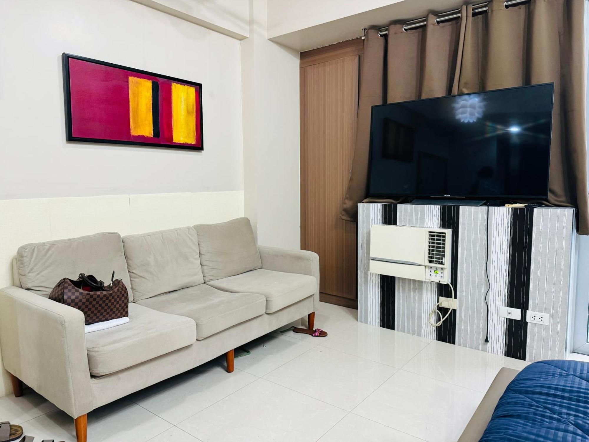 One Palm Tree Apartamento Manila