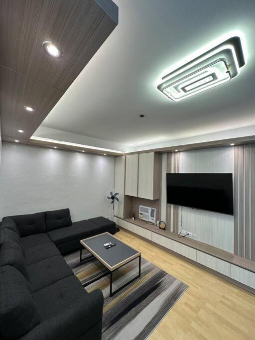 Spacious 2-bedroom Corner Unit Across Shangri-la Apartment