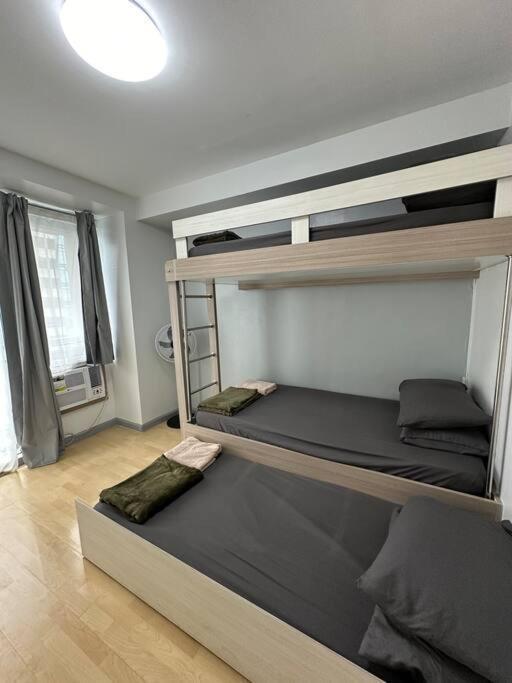 Spacious 2-bedroom Corner Unit Across Shangri-la Apartment Manila