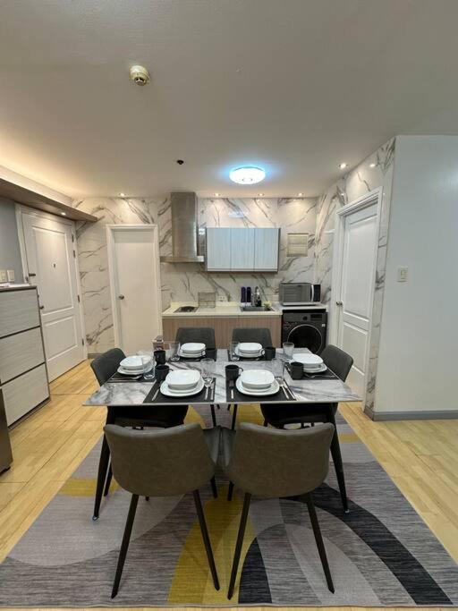 Spacious 2-bedroom Corner Unit Across Shangri-la Apartment