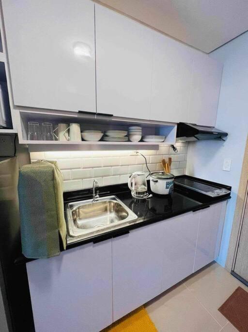 Unit In Quezon Grass Residences Tower 5 32nd Floor Manila